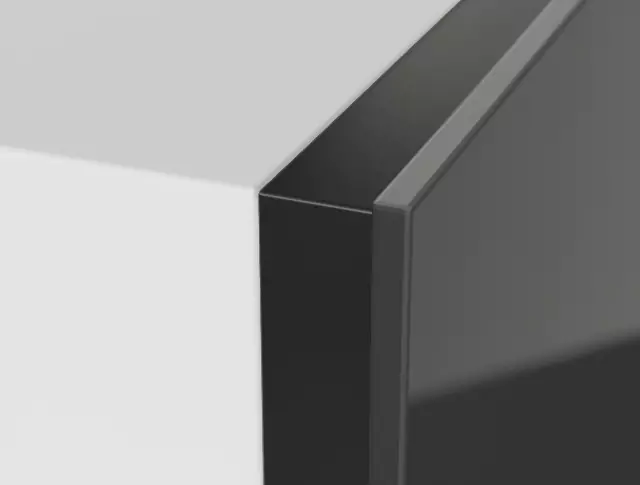 Black side trim in a white kitchen cabinet.